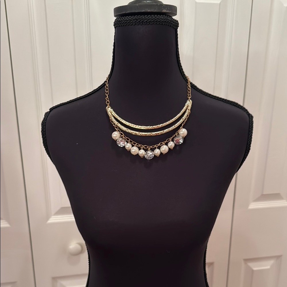 Elegant Gold Tone and Cream Bib Necklace with Pearl Like Accents